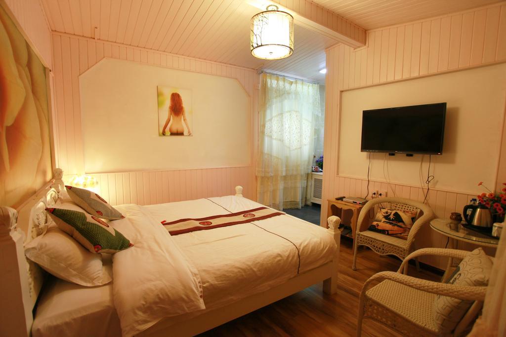 San Fang Qi Xiang Hostel Λιγιάνγκ Δωμάτιο φωτογραφία